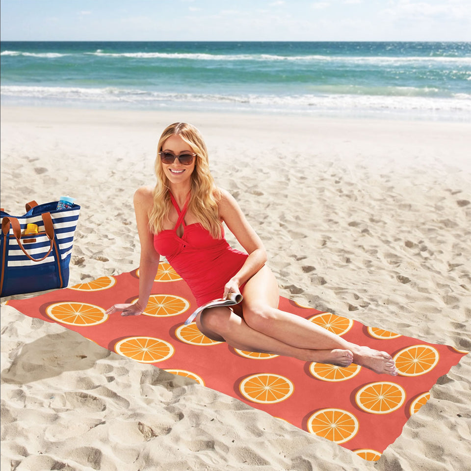 Oranges pattern red background Beach Towel