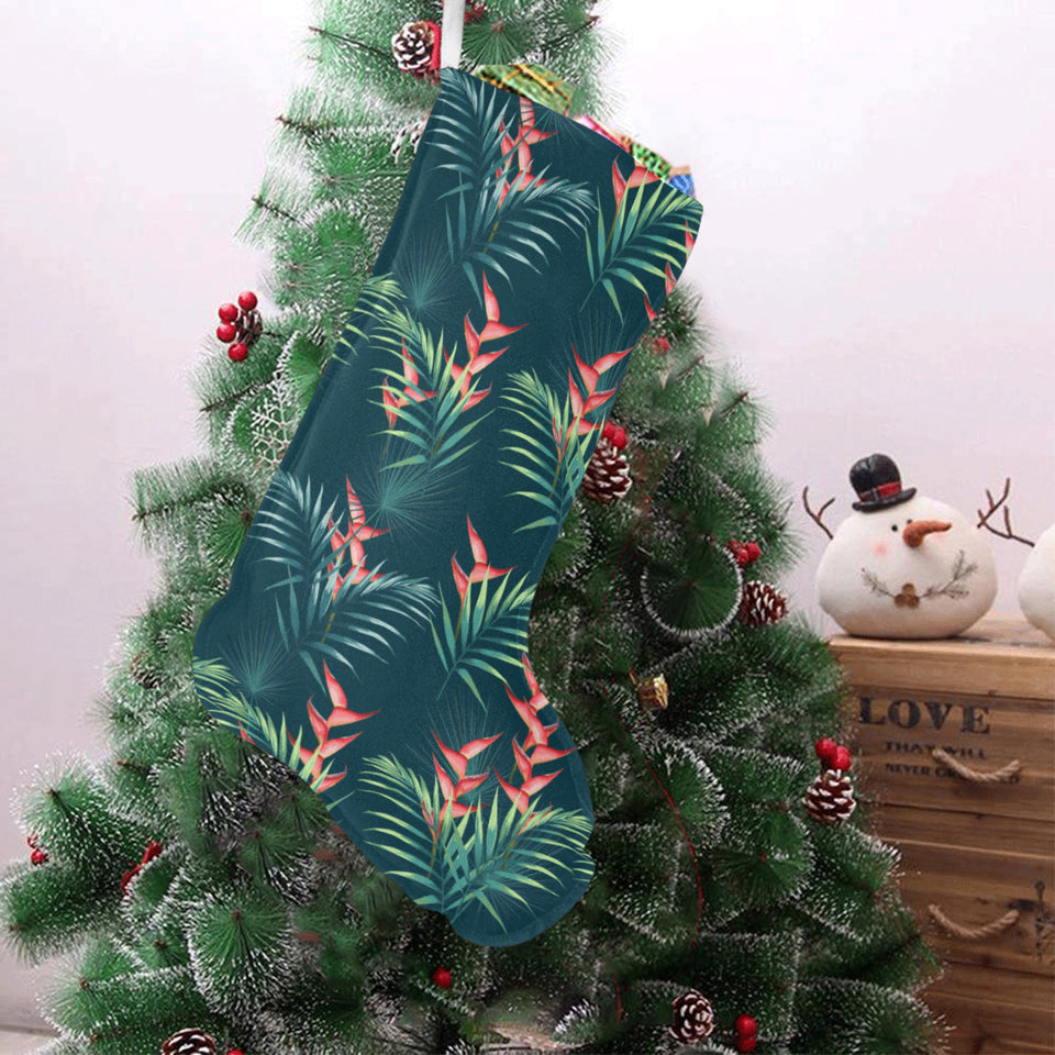 heliconia flowers, palm and monstera leaves on bla Christmas Stocking