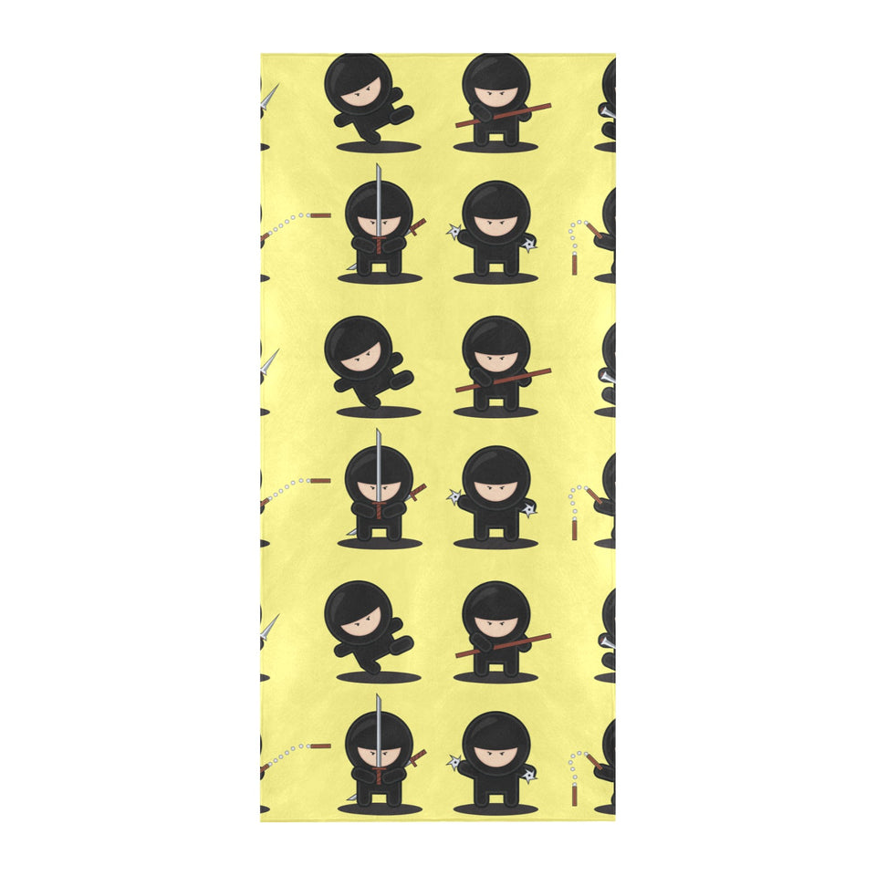 Cute ninja yellow background Beach Towel