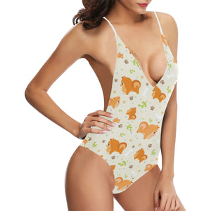 Cute brown pomeranian paw leave bone pattern Women's One-Piece Swimsuit