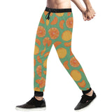 orange fruit pattern green background Unisex Casual Sweatpants