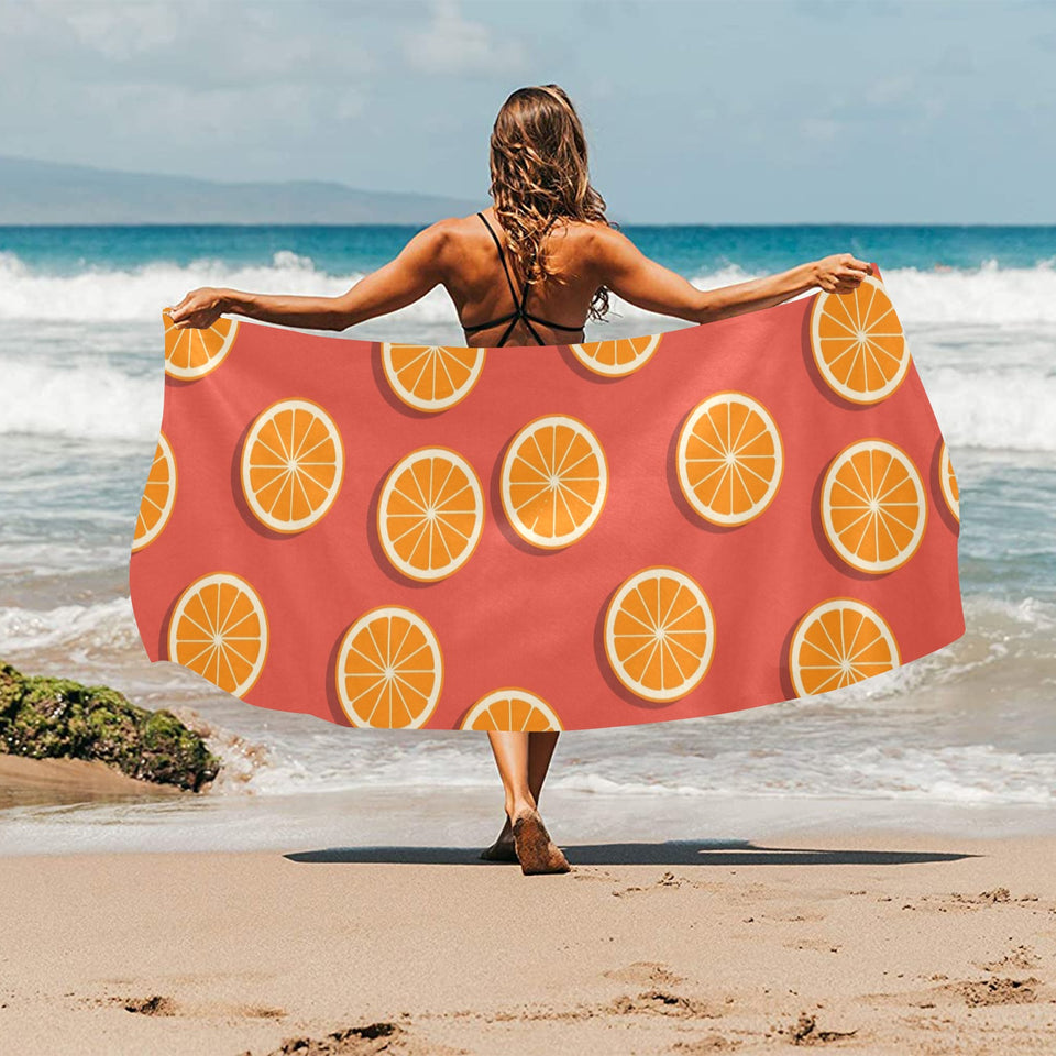 Oranges pattern red background Beach Towel
