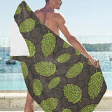 Hop pattern black background Beach Towel