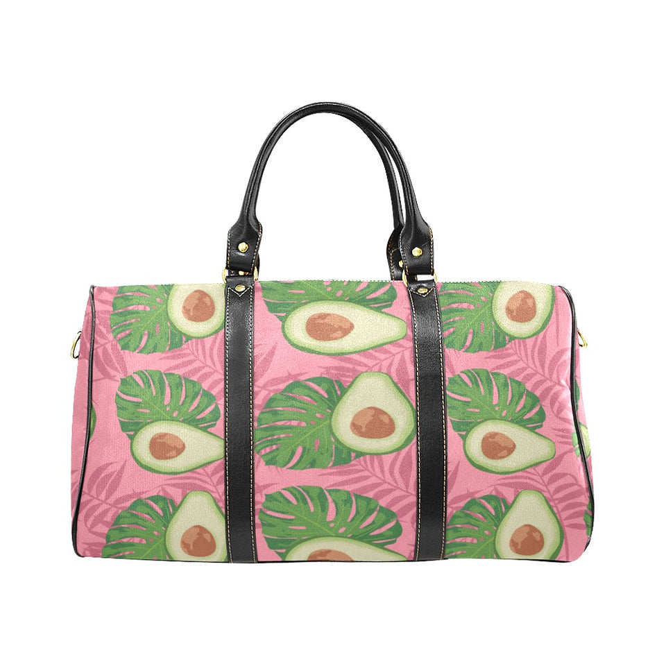 Avocado slices leaves pink back ground Travel Bag
