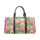 Avocado slices leaves pink back ground Travel Bag