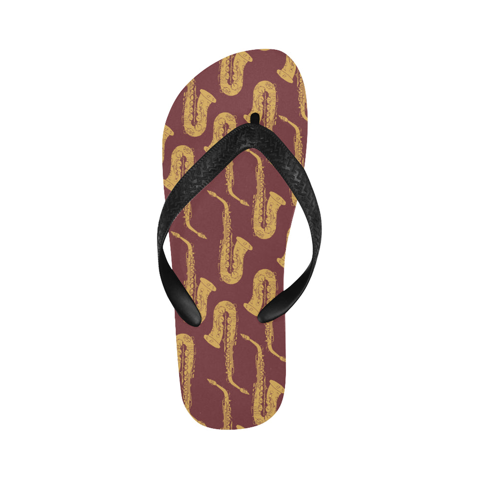 Hand drawn gold saxophone red background Unisex Flip Flops