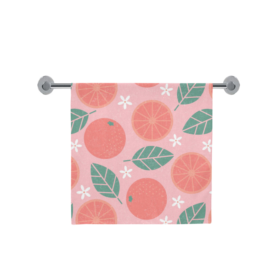 Grapefruit leaves flower pink background Bath Towel