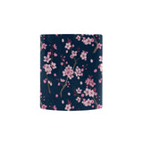Pink sakura cherry blossom blue background Morphing Mug Heat Changing Mug