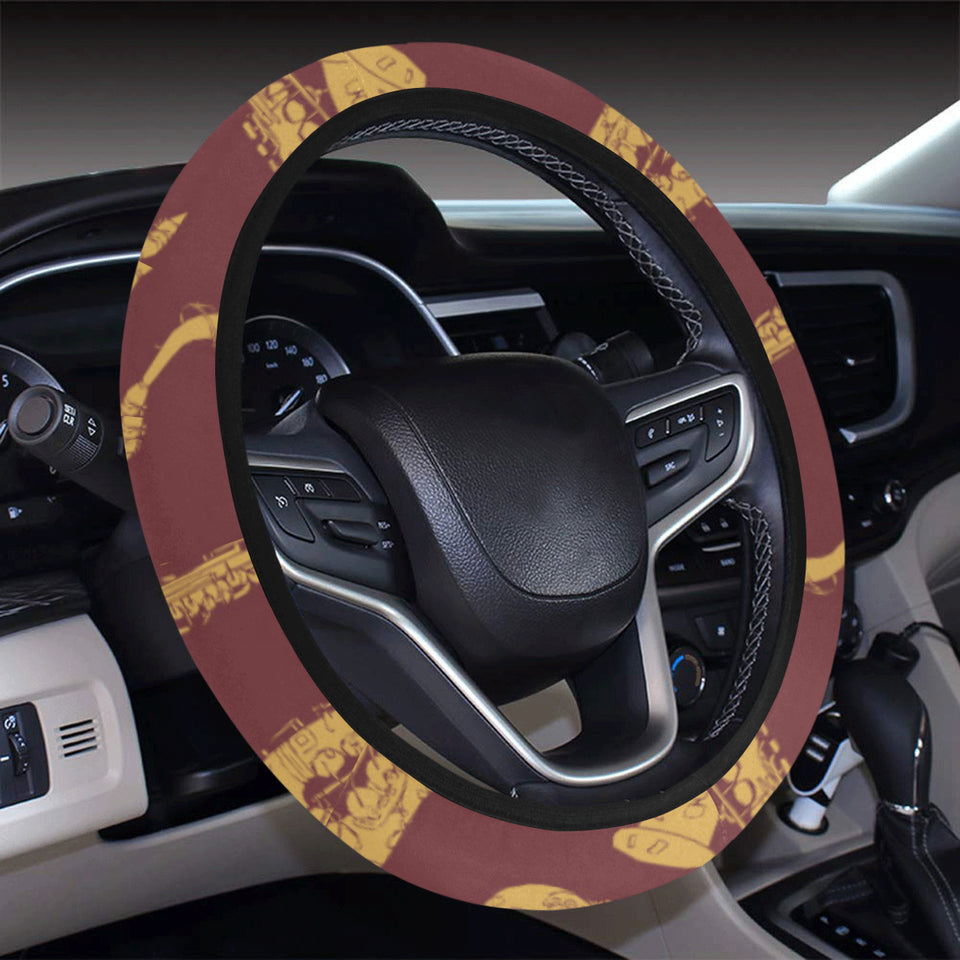 Hand drawn gold saxophone red background Car Steering Wheel Cover