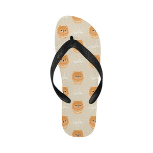 Cute brown pomeranian puppy on blue Unisex Flip Flops