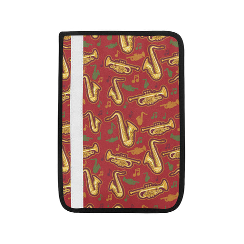 Saxophone cornet pattern red background Car Seat Belt Cover