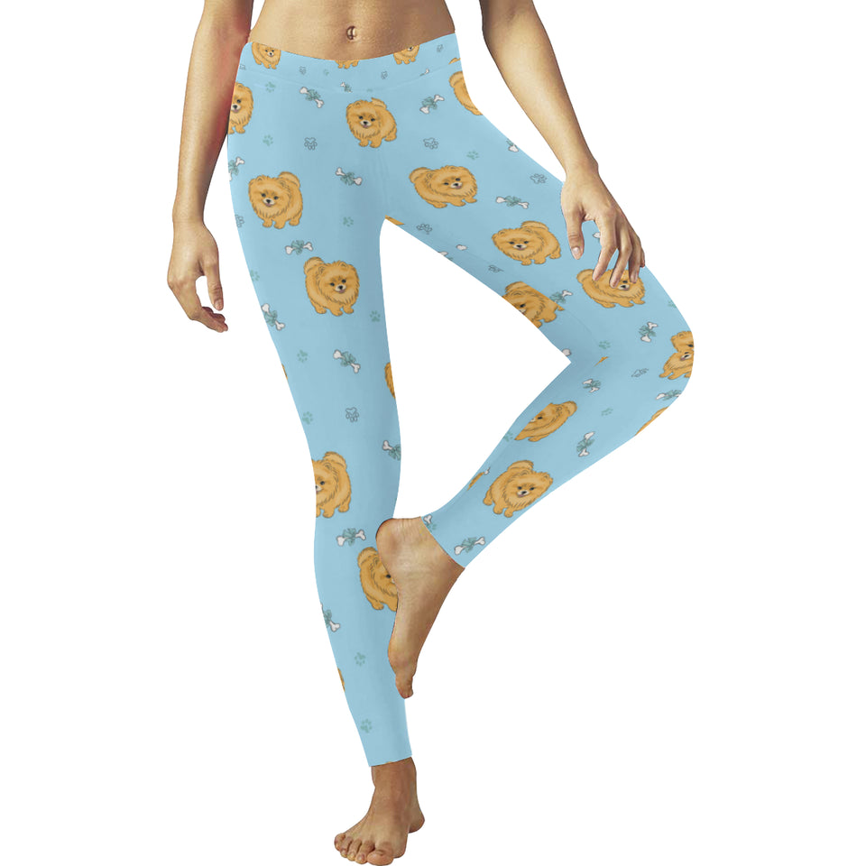 Brown cute pomeranian blue blackground Women's Legging Fulfilled In US