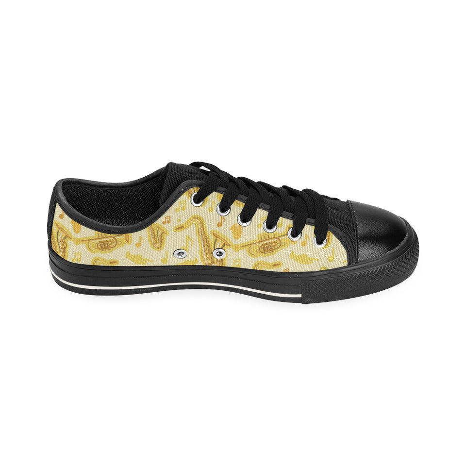 Saxophone cornet pattern yellow background Men's Low Top Canvas Shoes Black
