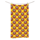 Daruma japanese wooden doll yellow background Bath Towel