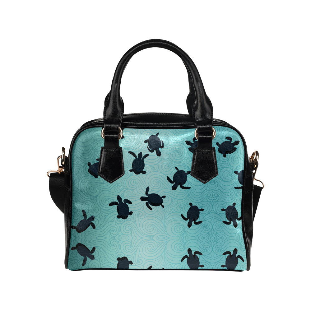 Sea turtle with blue ocean backgroud Shoulder Handbag