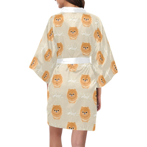 Cute brown pomeranian puppy on blue Women's Short Kimono Robe
