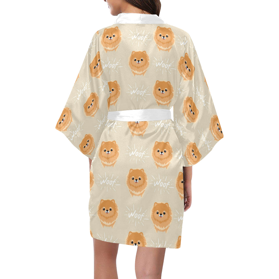 Cute brown pomeranian puppy on blue Women's Short Kimono Robe