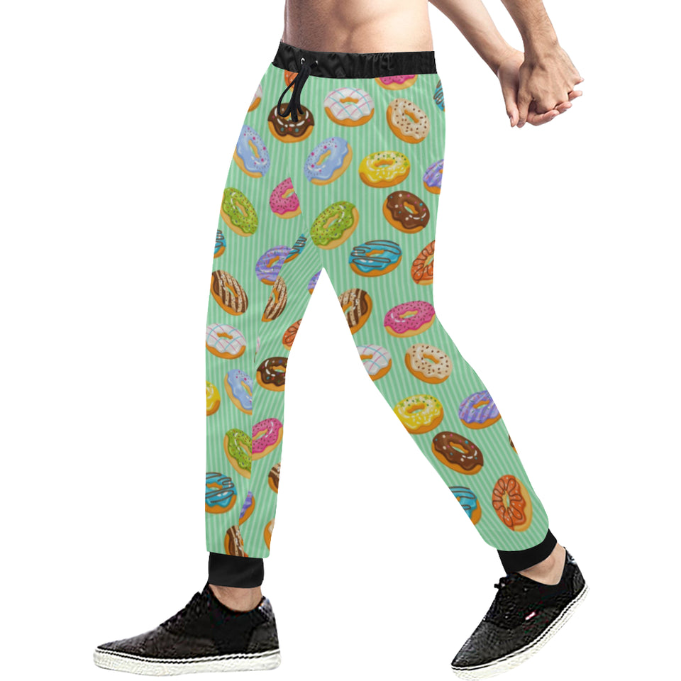 Colorful donut pattern green background Unisex Casual Sweatpants