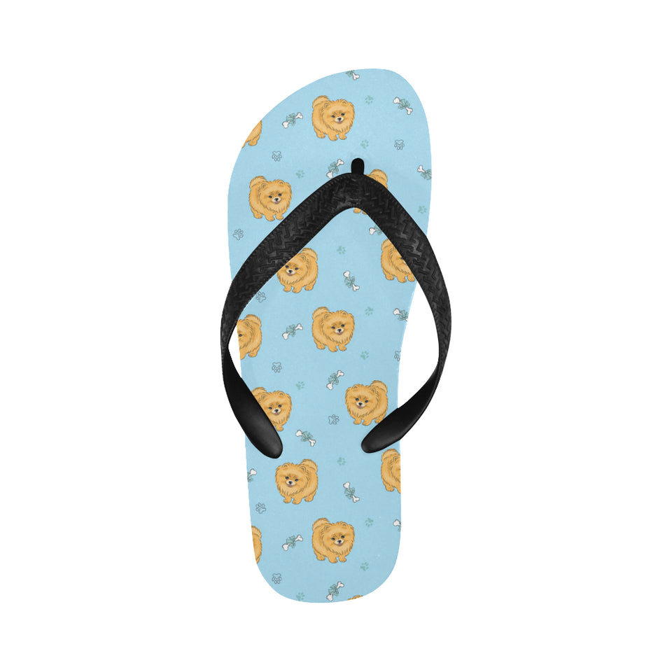 Brown cute pomeranian blue blackground Unisex Flip Flops