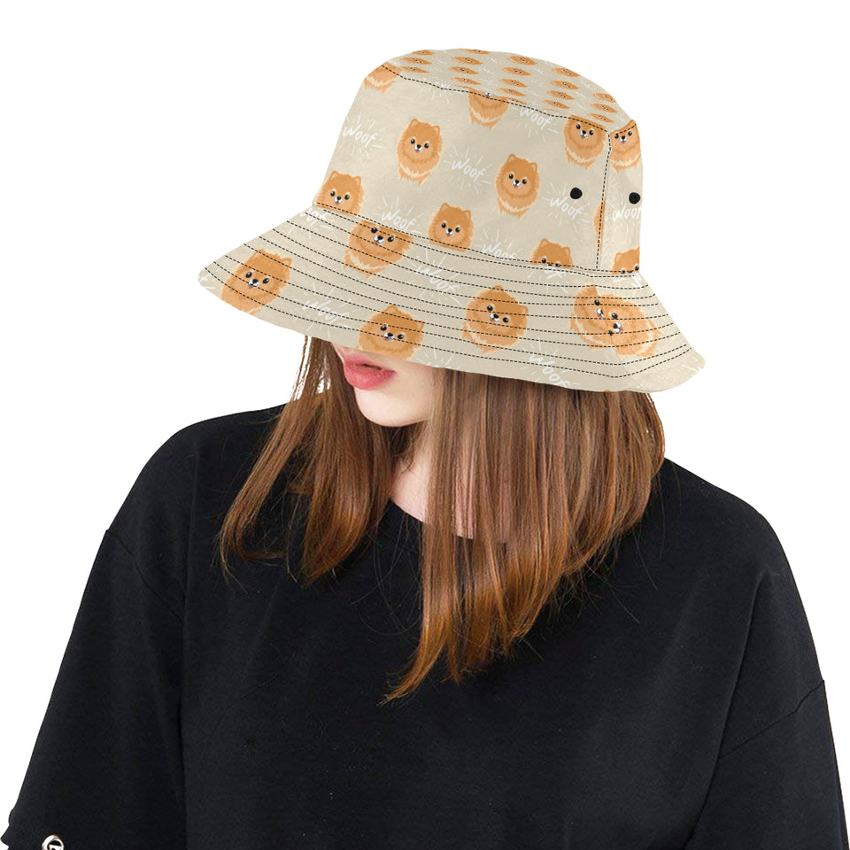 Cute brown pomeranian puppy on blue Unisex Bucket Hat