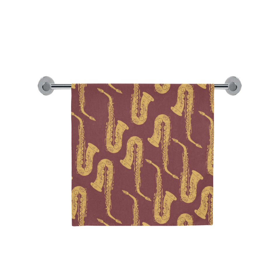 Hand drawn gold saxophone red background Bath Towel
