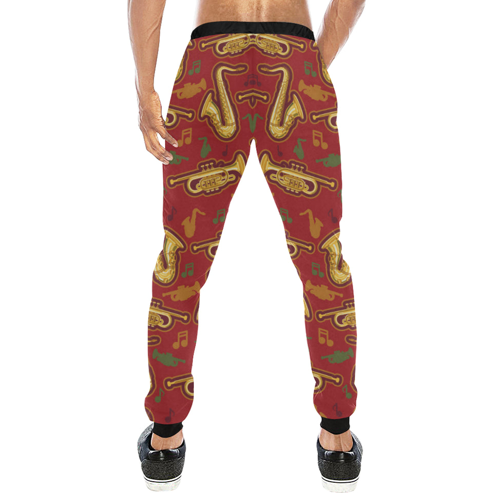 Saxophone cornet pattern red background Unisex Casual Sweatpants
