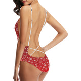 Snowflake pattern red background Women's One-Piece Swimsuit