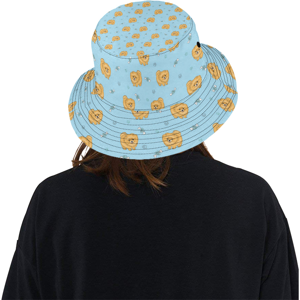 Brown cute pomeranian blue blackground Unisex Bucket Hat