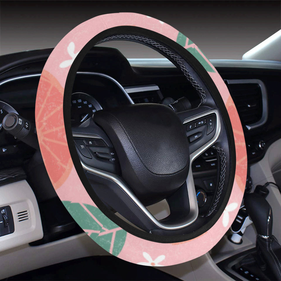 Grapefruit leaves flower pink background Car Steering Wheel Cover