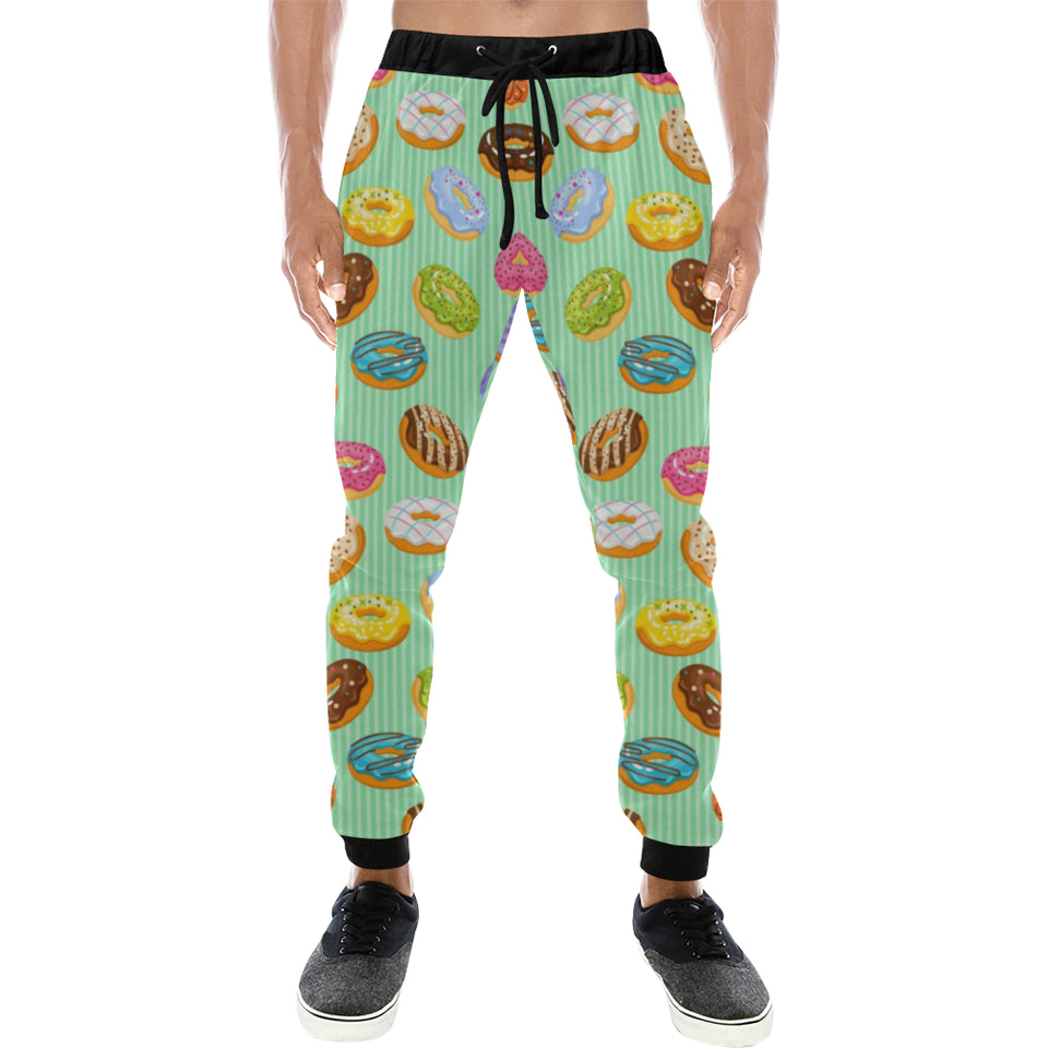 Colorful donut pattern green background Unisex Casual Sweatpants