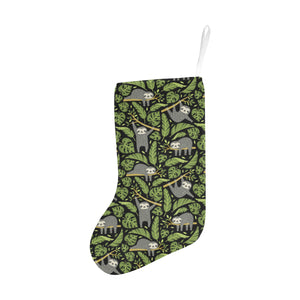 Cute sloths tropical palm leaves black background Christmas Stocking