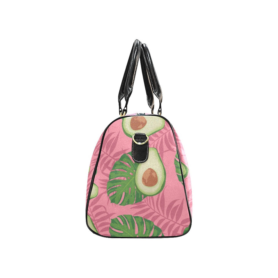 Avocado slices leaves pink back ground Travel Bag