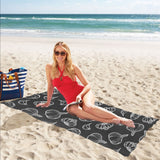 Garlic pattern black background Beach Towel