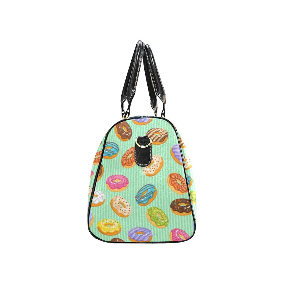 Colorful donut pattern green background Travel Bag