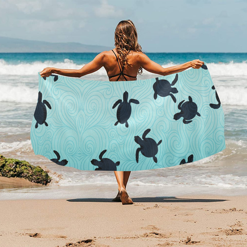 Sea turtle with blue ocean backgroud Beach Towel