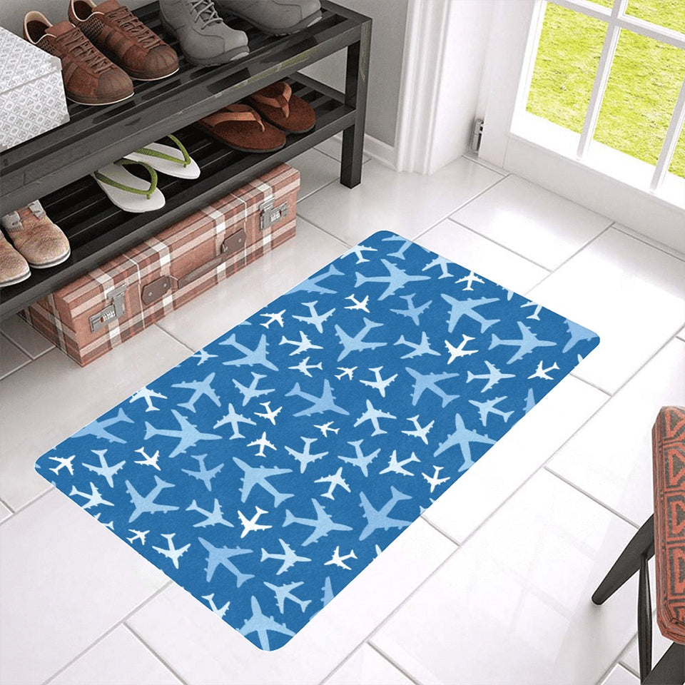 Airplane pattern in the sky Doormat