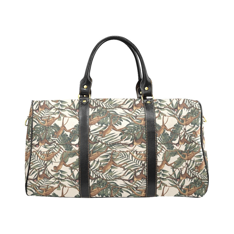 Monkey tropical leaves background Travel Bag