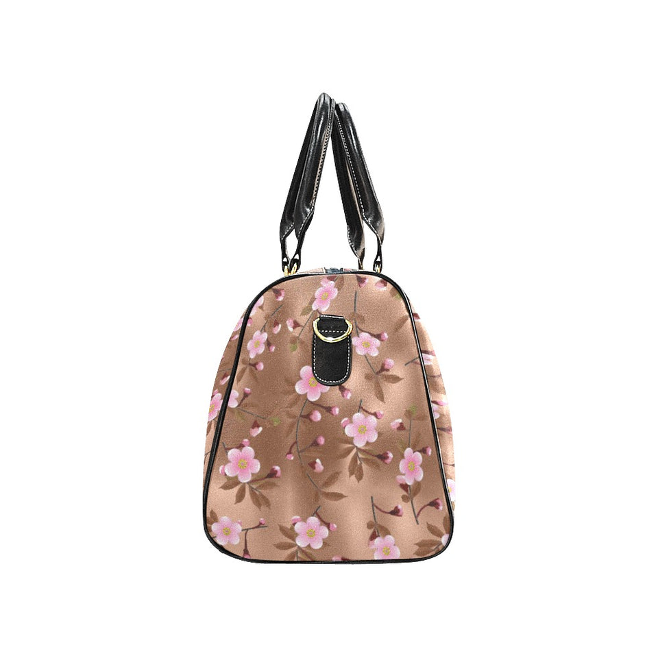 Pink sakura cherry blossom drak brown background Travel Bag