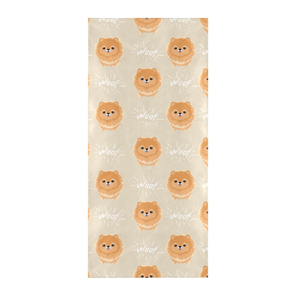 Cute brown pomeranian puppy on blue Beach Towel