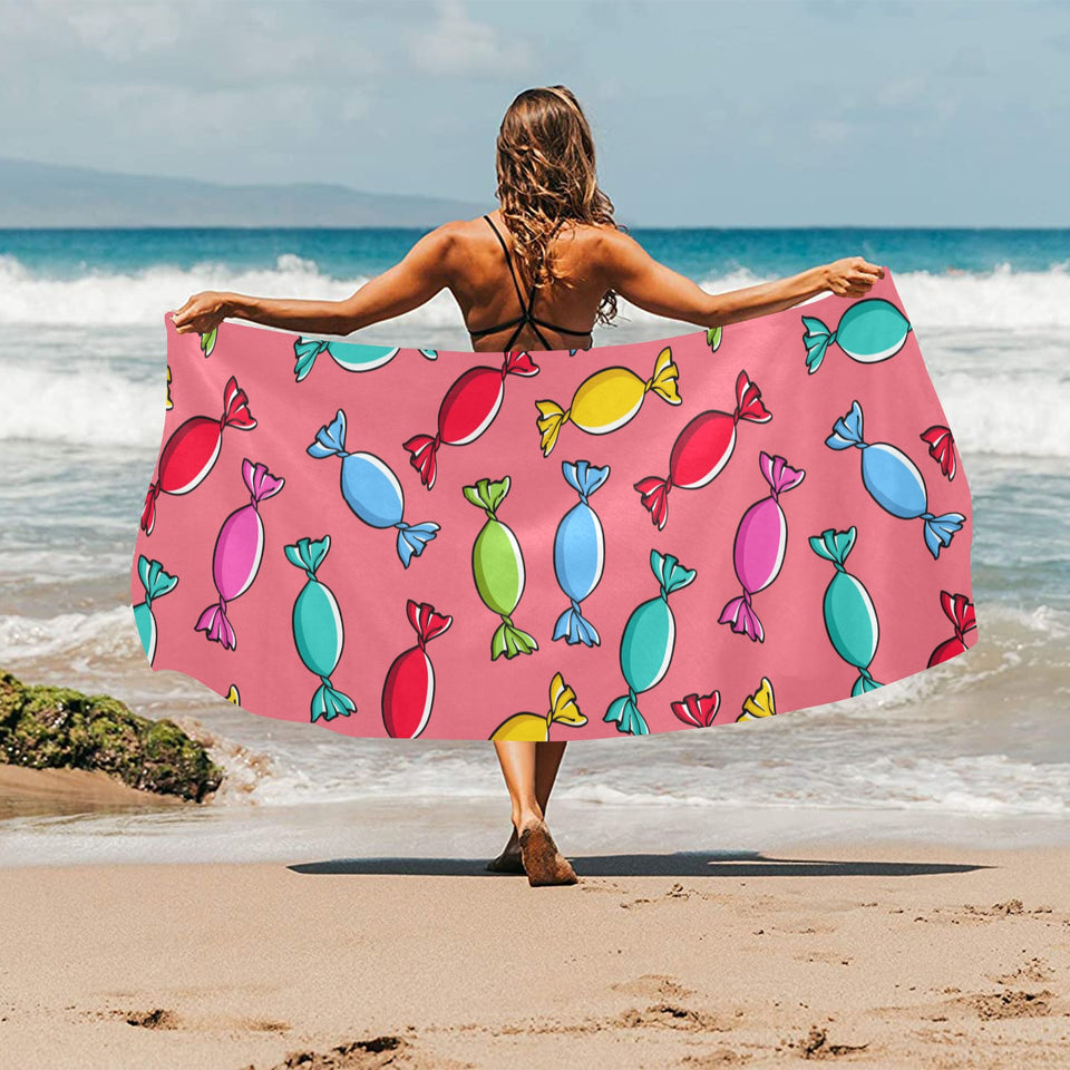 Colorful wrapped candy pattern Beach Towel