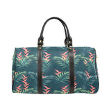 heliconia flowers, palm and monstera leaves on bla Travel Bag
