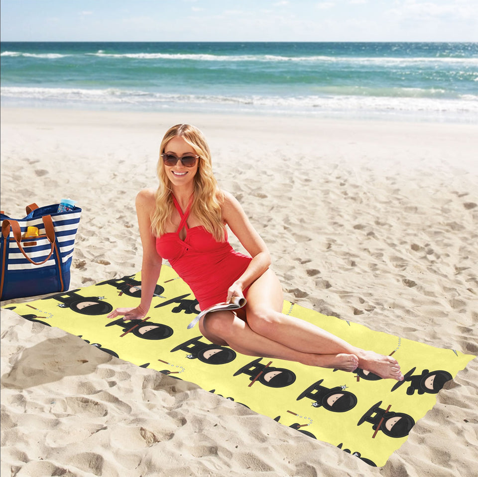Cute ninja yellow background Beach Towel