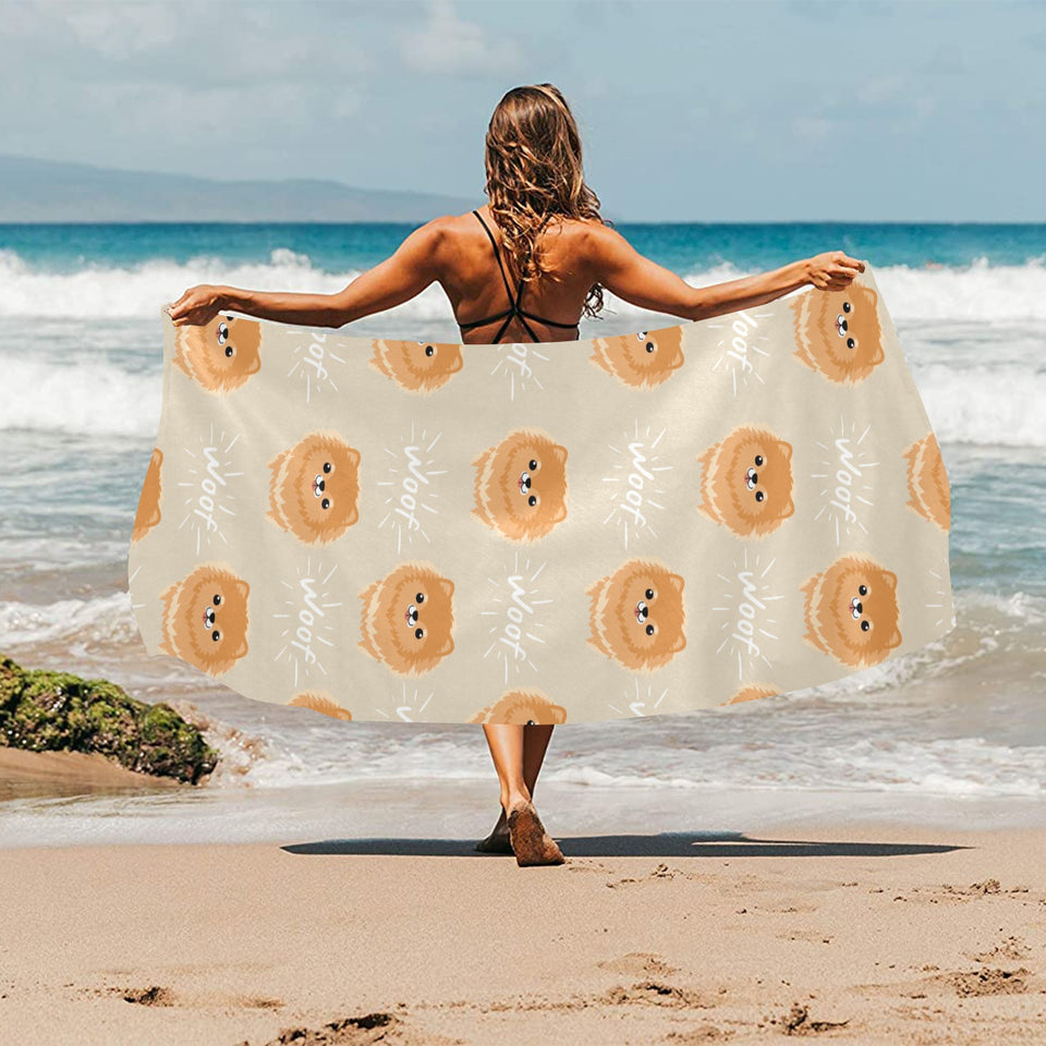 Cute brown pomeranian puppy on blue Beach Towel