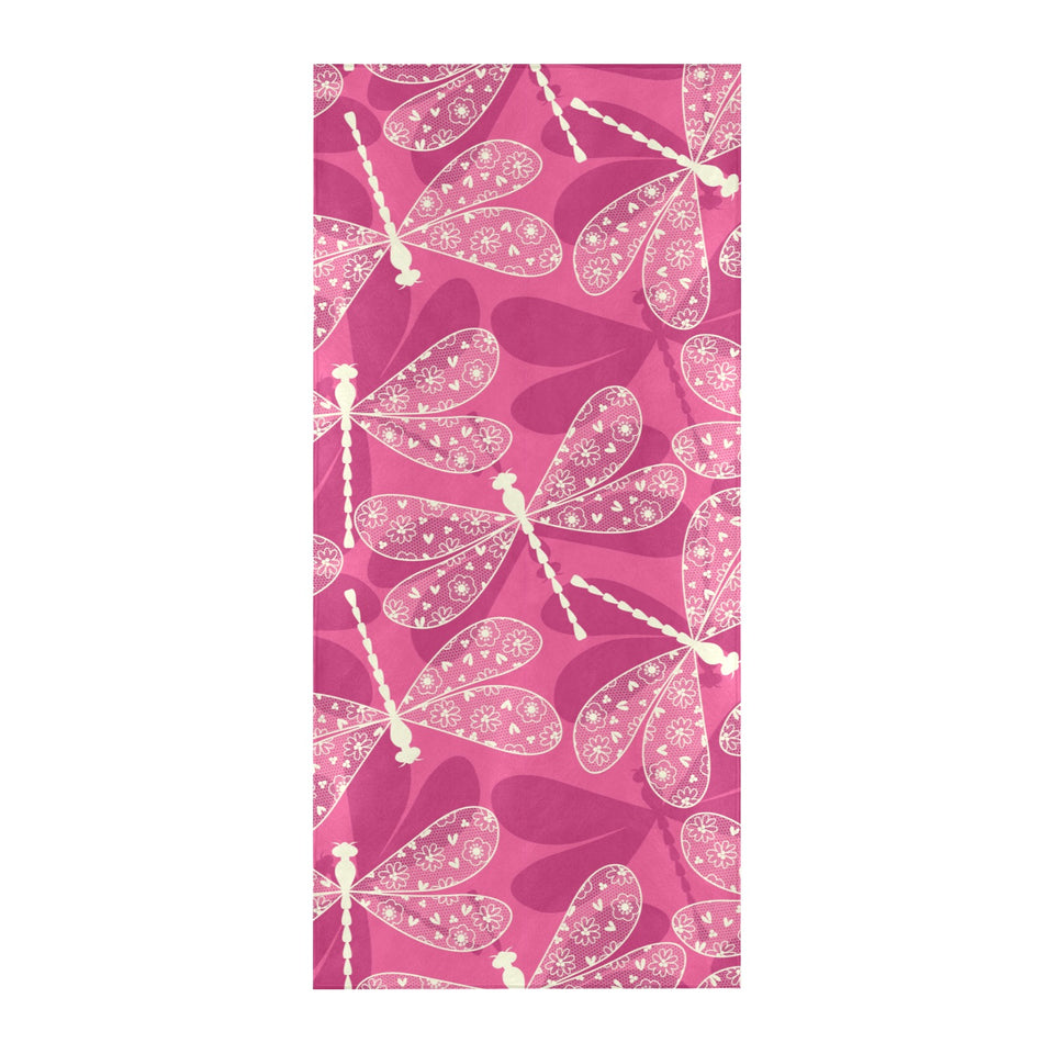Beautiful dragonfly pink background Beach Towel