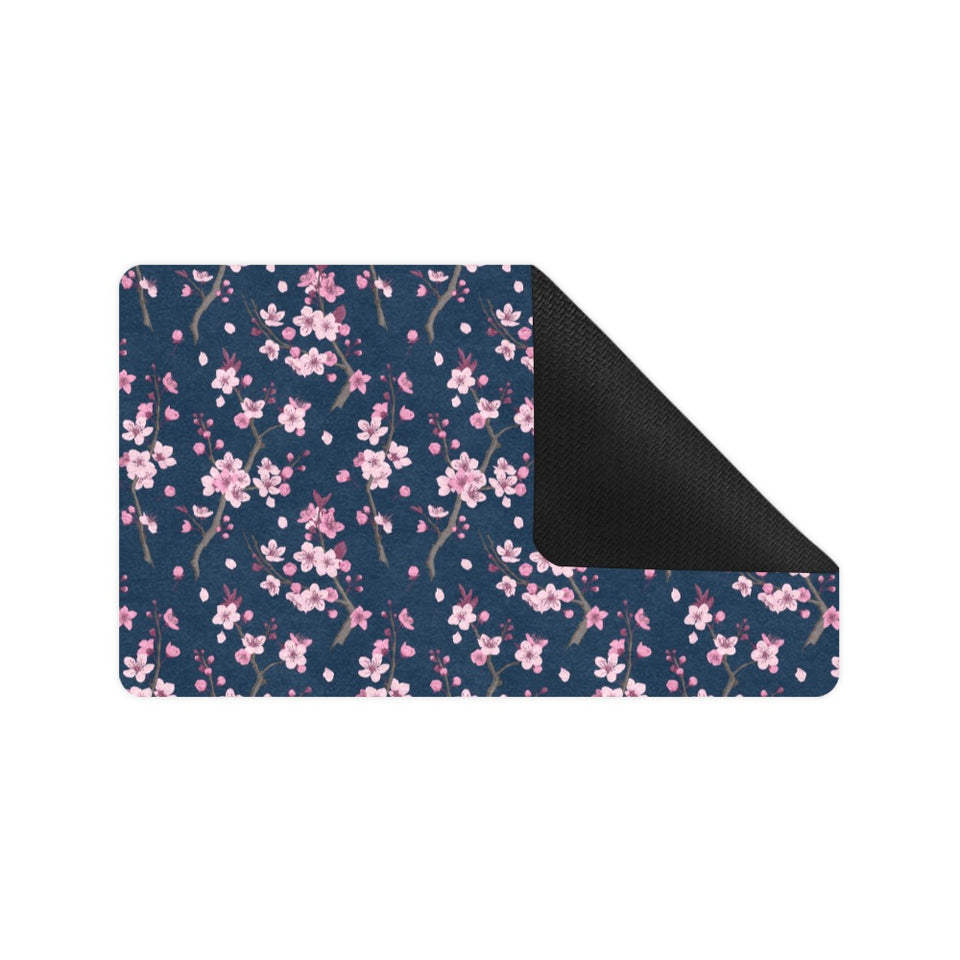 Pink sakura cherry blossom blue background Doormat