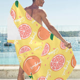 Grapefruit yellow background Beach Towel