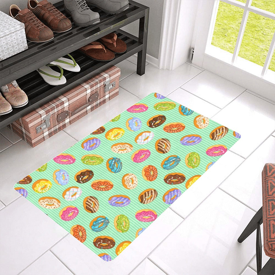 Colorful donut pattern green background Doormat