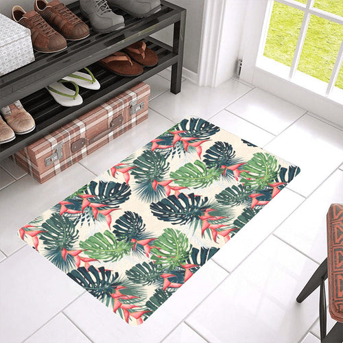 heliconia flowers, palm and monstera leaves Doormat