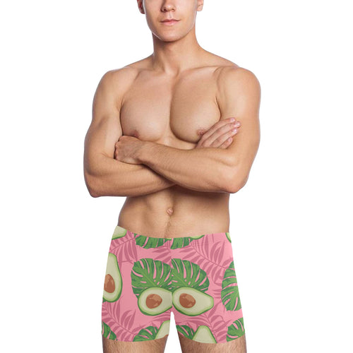 Avocado slices leaves pink back ground Men's Swimming Trunks