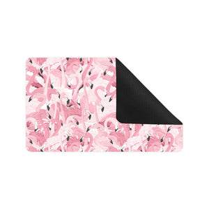 Pink flamingos pattern background Doormat